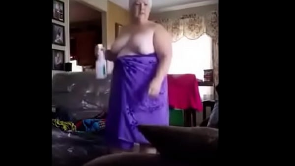 See Fat Christine K. topless as she come into the frontroom.